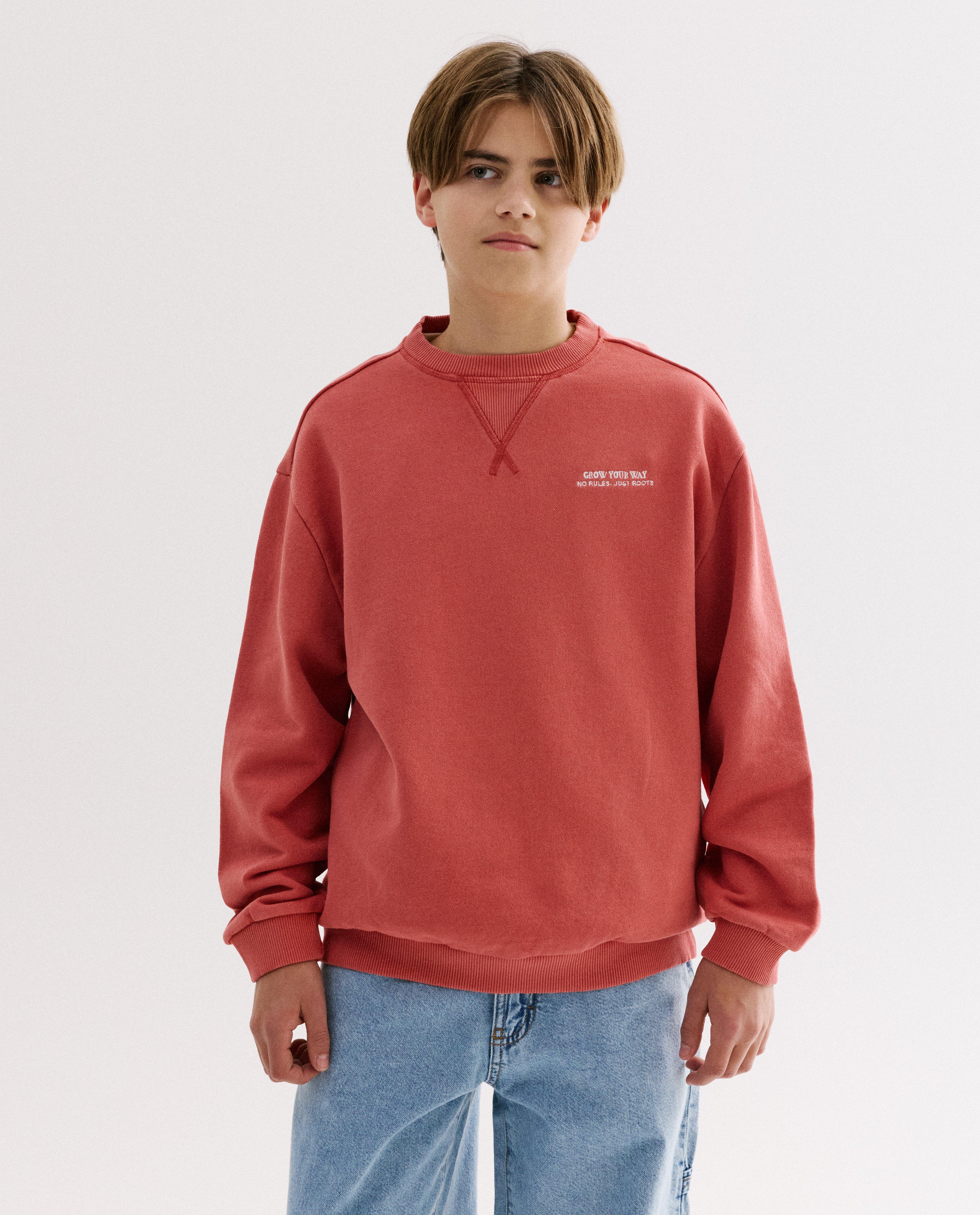 Sweater met geborduurd opschrift