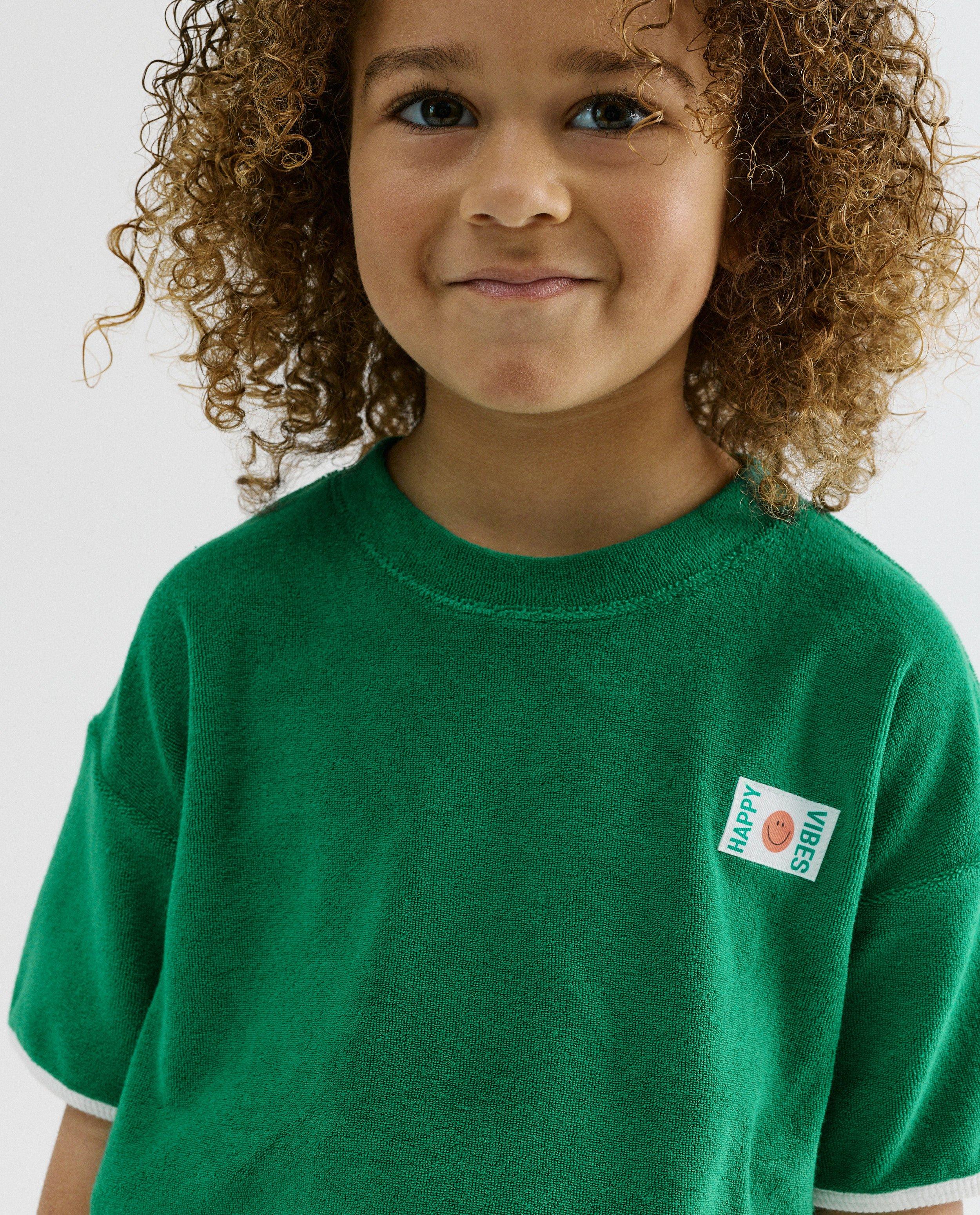 T-shirts - T-shirt avec label textile, coupe loose, 98-134